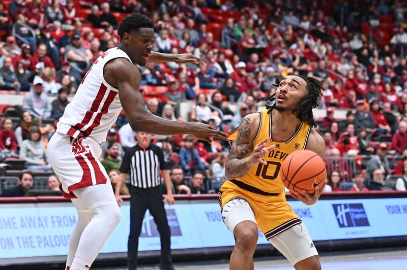 Jan 28, 2023; Pullman, Washington, USA; Arizona State Sun Devils guard Frankie Collins (10) shoots the ball against Washington State Cougars guard TJ Bamba (5) in the second half at Friel Court at Beasley Coliseum. Washington State won 75-58. Mandatory Credit: James Snook-USA TODAY Sports