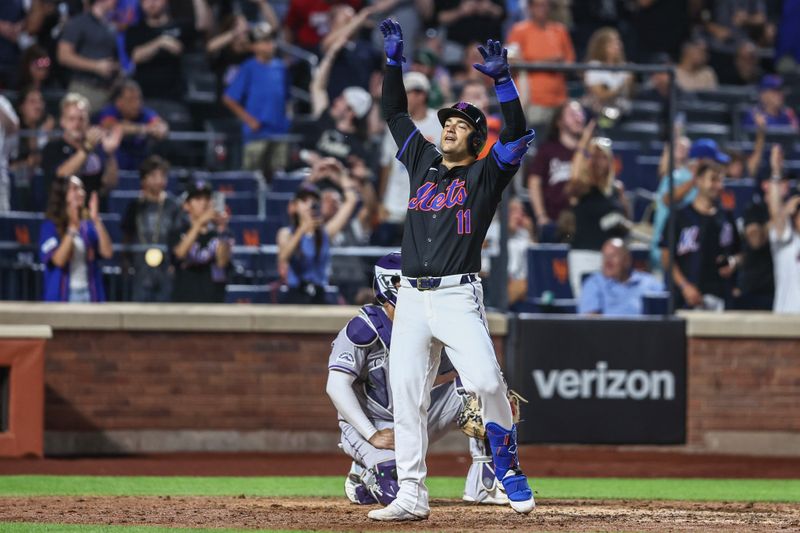 Jul 12, 2024; New York City, New York, USA;  New York Mets second baseman Jose Iglesias (11) celebrates after hitting a solo home run in the fifth inning against the Colorado Rockies at Citi Field. Mandatory Credit: Wendell Cruz-USA TODAY Sports