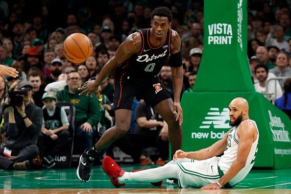 Boston, MA - December 28: Boston Celtics PG Derrick White loses the ball in the second quarter. The Celtics beat the Detroit Pistons, 128-122, in overtime. (Photo by Danielle Parhizkaran/The Boston Globe via Getty Images)