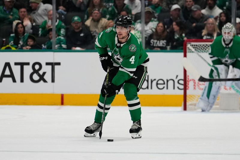 Feb 17, 2024; Dallas, Texas, USA;  Dallas Stars defenseman Miro Heiskanen (4) skates with the puck against the Edmonton Oilers during the second period at American Airlines Center. Mandatory Credit: Chris Jones-USA TODAY Sports