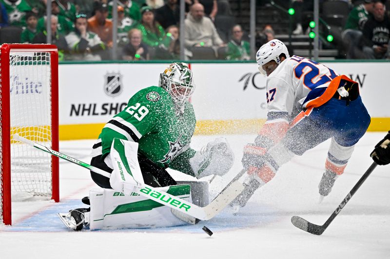 Oct 12, 2024; Dallas, Texas, USA; Dallas Stars goaltender Jake Oettinger (29) stops a breakaway shot by New York Islanders left wing Anders Lee (27) during the third period at the American Airlines Center. Mandatory Credit: Jerome Miron-Imagn Images