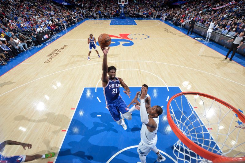 PHILADELPHIA, PA - FEBRUARY 23: Joel Embiid #21 of the Philadelphia 76ers shoots the ball during the game against the Memphis Grizzlies on February 23, 2023 at the Wells Fargo Center in Philadelphia, Pennsylvania NOTE TO USER: User expressly acknowledges and agrees that, by downloading and/or using this Photograph, user is consenting to the terms and conditions of the Getty Images License Agreement. Mandatory Copyright Notice: Copyright 2023 NBAE (Photo by Jesse D. Garrabrant/NBAE via Getty Images)