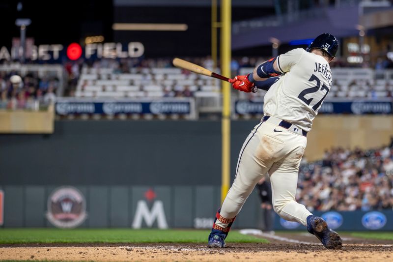 May 3, 2024; Minneapolis, Minnesota, USA; Minnesota Twins catcher Ryan Jeffers (27) hits a three run double against the Boston Red Sox in the seventh inning at Target Field. Mandatory Credit: Jesse Johnson-USA TODAY Sports