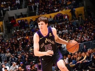LOS ANGELES, CA - DECEMBER 18:  Austin Reaves #15 of the Los Angeles Lakers handles the ball during the game  on December 18, 2023 at Crypto.Com Arena in Los Angeles, California. NOTE TO USER: User expressly acknowledges and agrees that, by downloading and/or using this Photograph, user is consenting to the terms and conditions of the Getty Images License Agreement. Mandatory Copyright Notice: Copyright 2023 NBAE (Photo by Adam Pantozzi/NBAE via Getty Images)
