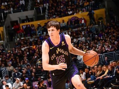 LOS ANGELES, CA - DECEMBER 18:  Austin Reaves #15 of the Los Angeles Lakers handles the ball during the game  on December 18, 2023 at Crypto.Com Arena in Los Angeles, California. NOTE TO USER: User expressly acknowledges and agrees that, by downloading and/or using this Photograph, user is consenting to the terms and conditions of the Getty Images License Agreement. Mandatory Copyright Notice: Copyright 2023 NBAE (Photo by Adam Pantozzi/NBAE via Getty Images)