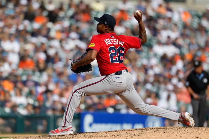 Sep 20, 2025; Detroit, Michigan, USA;  Atlanta Braves pitcher Raisel Iglesias (26) pitches in the ninth inning against the Detroit Tigers at Comerica Park. Mandatory Credit: Rick Osentoski-Imagn Images