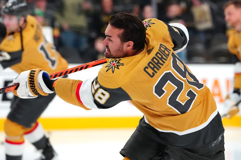 Mar 19, 2024; Las Vegas, Nevada, USA; Vegas Golden Knights left wing William Carrier (28) warms up before the start of a game against the Tampa Bay Lighting at T-Mobile Arena. Mandatory Credit: Stephen R. Sylvanie-USA TODAY Sports