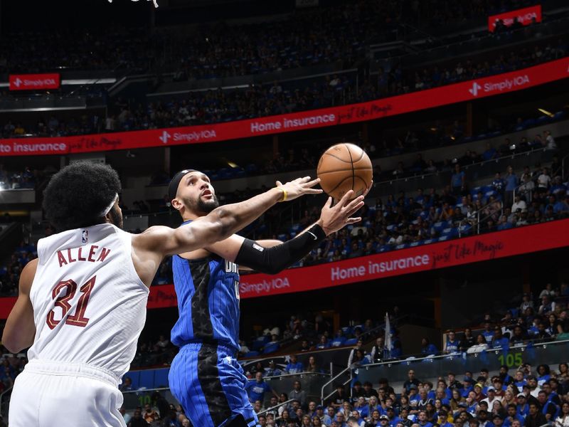 ORLANDO, FL - APRIL 27: Jalen Suggs #4 of the Orlando Magic drives to the basket during the game against the Cleveland Cavaliers during Round 1 Game 4 of the 2024 NBA Playoffs on April 27, 2024 at the Kia Center in Orlando, Florida. NOTE TO USER: User expressly acknowledges and agrees that, by downloading and or using this photograph, User is consenting to the terms and conditions of the Getty Images License Agreement. Mandatory Copyright Notice: Copyright 2024 NBAE (Photo by Fernando Medina/NBAE via Getty Images)