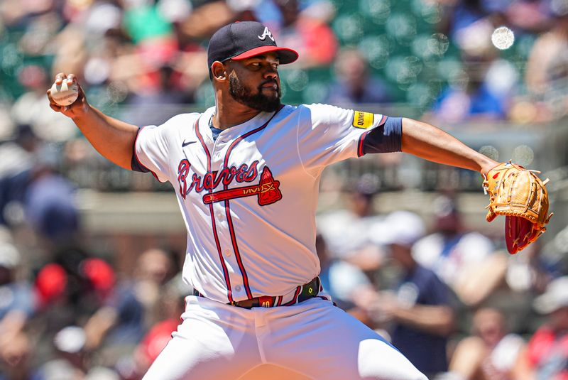 May 20, 2024; Cumberland, Georgia, USA; Atlanta Braves starting pitcher Reynaldo Lopez (40) pitches against the San Diego Padres during the fourth inning at Truist Park. Mandatory Credit: Dale Zanine-USA TODAY Sports