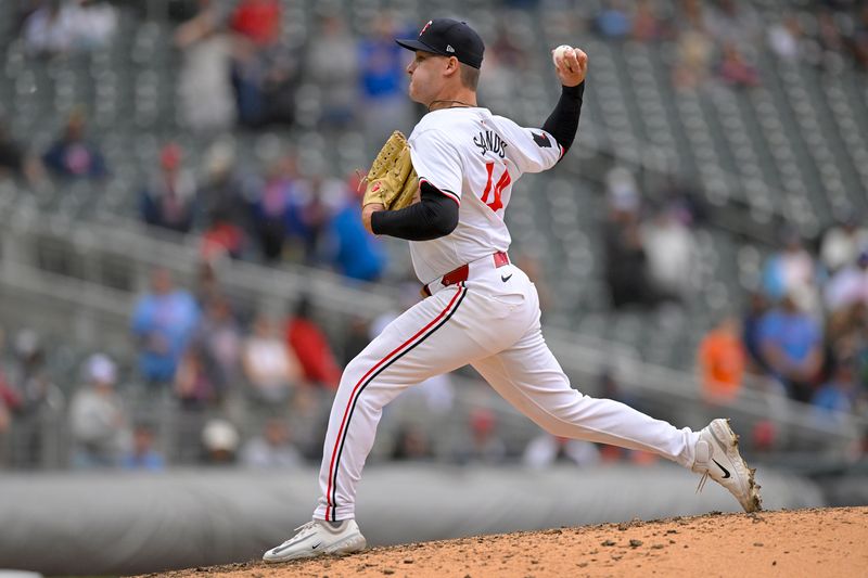 May 27, 2024; Minneapolis, Minnesota, USA; Minnesota Twins relief pitcher Cole Sands (44) delivers a pitch against the Kansas City Royals during the ninth inning at Target Field. Mandatory Credit: Nick Wosika-USA TODAY Sports