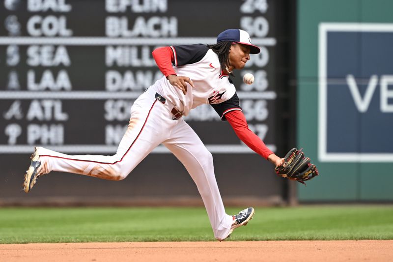 Sep 1, 2024; Washington, District of Columbia, USA; Washington Nationals second baseman Luis Garcia Jr. (2) misplays a ground ball against the Chicago Cubs during the fourth inning at Nationals Park. Mandatory Credit: Rafael Suanes-USA TODAY Sports