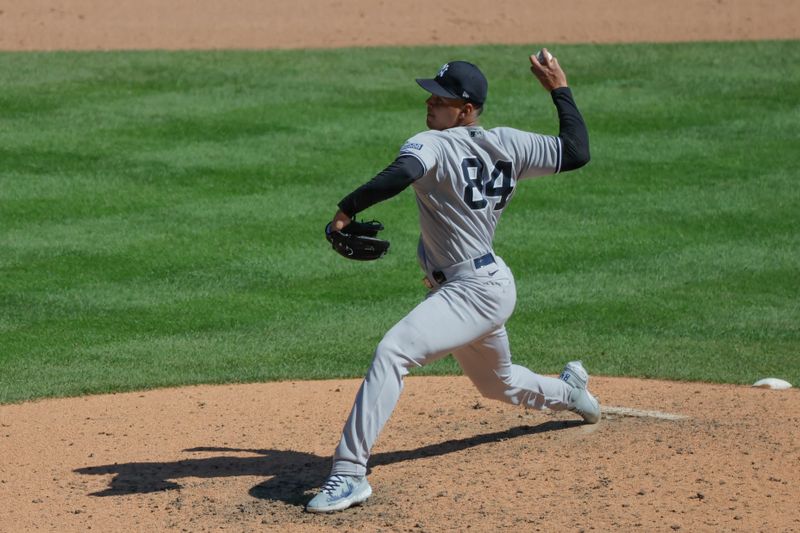 Aug 31, 2023; Detroit, Michigan, USA; New York Yankees relief pitcher Albert Abreu (84) pitches in the eighth inning against the Detroit Tigers at Comerica Park. Mandatory Credit: Rick Osentoski-USA TODAY Sports