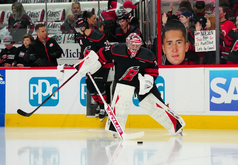 Apr 30, 2024; Raleigh, North Carolina, USA; Carolina Hurricanes goaltender Frederik Andersen (31) skates onto the ice for warmups before the game against the New York Islanders in game five of the first round of the 2024 Stanley Cup Playoffs at PNC Arena. Mandatory Credit: James Guillory-USA TODAY Sports