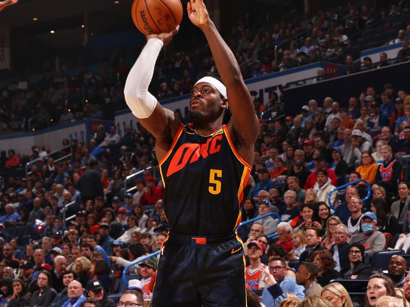 OKLAHOMA CITY, OK - FEBRUARY 11: Luguentz Dort #5 of the Oklahoma City Thunder shoots the ball during the game against the Sacramento Kings on February 11, 2024 at Paycom Arena in Oklahoma City, Oklahoma. NOTE TO USER: User expressly acknowledges and agrees that, by downloading and or using this photograph, User is consenting to the terms and conditions of the Getty Images License Agreement. Mandatory Copyright Notice: Copyright 2024 NBAE (Photo by Zach Beeker/NBAE via Getty Images)