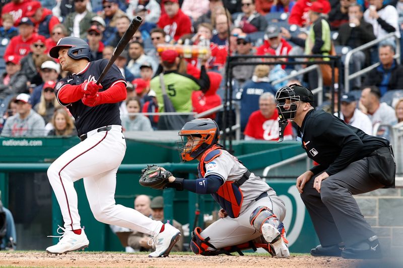 Apr 21, 2024; Washington, District of Columbia, USA; Washington Nationals third base Nick Senzel (13) hits a home run against the Houston Astros during the sixth inning at Nationals Park. Mandatory Credit: Geoff Burke-USA TODAY Sports