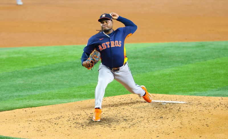 Aug 6, 2024; Arlington, Texas, USA;  Houston Astros starting pitcher Framber Valdez (59) throws during the fourth inning against the Texas Rangers at Globe Life Field. Mandatory Credit: Kevin Jairaj-USA TODAY Sports