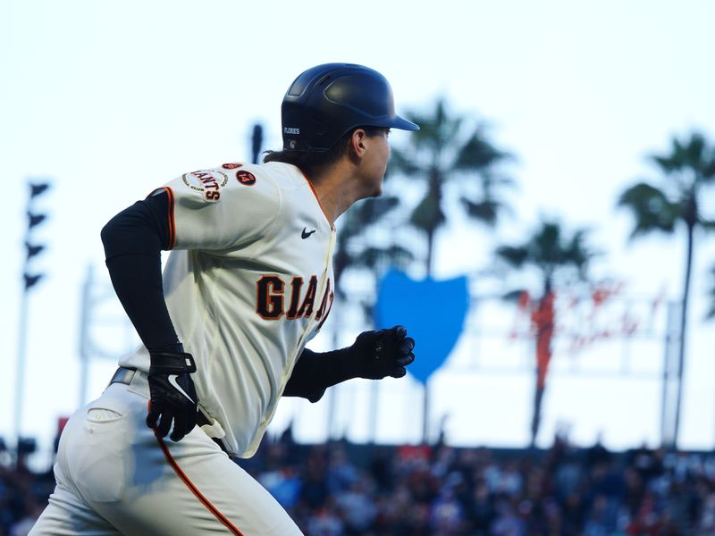 Aug 28, 2023; San Francisco, California, USA; San Francisco Giants designated hitter Wilmer Flores (41) runs as he hits an RBI double against the San Francisco Giants during the first inning at Oracle Park. Mandatory Credit: Kelley L Cox-USA TODAY Sports