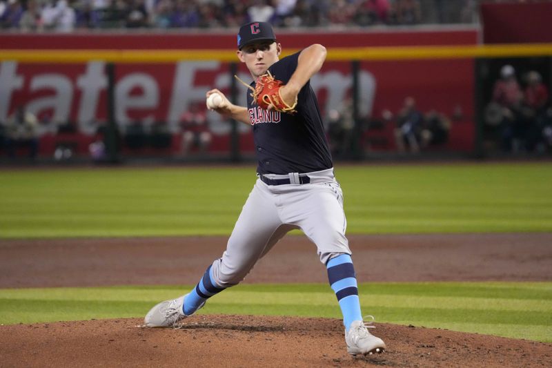 Jun 18, 2023; Phoenix, Arizona, USA; Cleveland Guardians starting pitcher Tanner Bibee (61) pitches against the Arizona Diamondbacks during the third inning at Chase Field. Mandatory Credit: Joe Camporeale-USA TODAY Sports