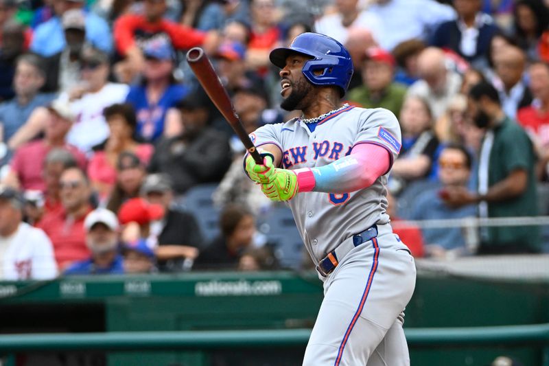 Aug 21, 2025; Washington, District of Columbia, USA; New York Mets designated hitter Starling Marte (6) hits a solo home run against the Washington Nationals during the third inning at Nationals Park. Mandatory Credit: Brad Mills-Imagn Images
