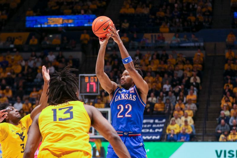 Jan 10, 2026; Morgantown, West Virginia, USA; Kansas Jayhawks guard Darryn Peterson (22) shoots a three pointer during the first half against the West Virginia Mountaineers at Hope Coliseum. Mandatory Credit: Ben Queen-Imagn Images