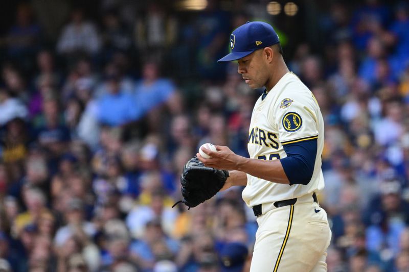 Aug 28, 2025; Milwaukee, Wisconsin, USA; Milwaukee Brewers starting pitcher Jose Quintana (62) reacts after giving up a run against the Arizona Diamondbacks in the third inning at American Family Field. Mandatory Credit: Benny Sieu-Imagn Images