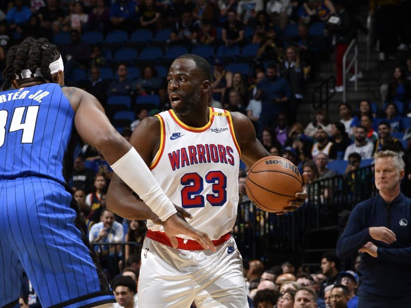 ORLANDO, FL - FEBRUARY 27:  Draymond Green #23 of the Golden State Warriors dribbles the ball during the game against the Orlando Magic on February 27, 2025 at Kia Center in Orlando, Florida. NOTE TO USER: User expressly acknowledges and agrees that, by downloading and or using this photograph, User is consenting to the terms and conditions of the Getty Images License Agreement. Mandatory Copyright Notice: Copyright 2025 NBAE (Photo by Fernando Medina/NBAE via Getty Images)