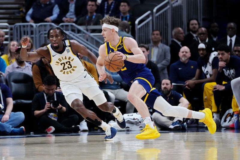 INDIANAPOLIS, INDIANA - FEBRUARY 08: Brandin Podziemski #2 of the Golden State Warriors controls the ball against Aaron Nesmith #23 of the Indiana Pacers in the first quarter at Gainbridge Fieldhouse on February 08, 2024 in Indianapolis, Indiana. NOTE TO USER: User expressly acknowledges and agrees that, by downloading and or using this photograph, User is consenting to the terms and conditions of the Getty Images License Agreement. (Photo by Dylan Buell/Getty Images)