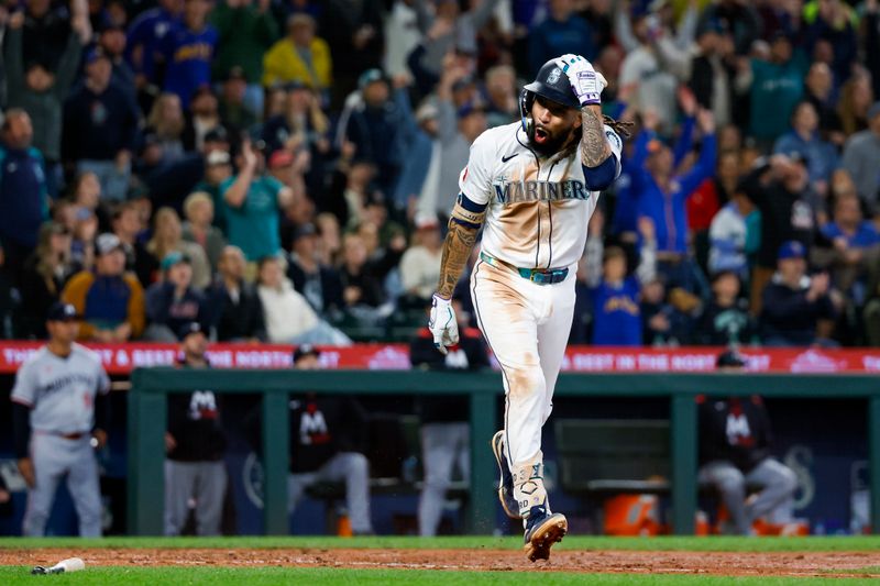 May 31, 2025; Seattle, Washington, USA; Seattle Mariners shortstop J.P. Crawford (3) reacts after hitting a two-run home run against the Minnesota Twins during the seventh inning at T-Mobile Park. Mandatory Credit: Joe Nicholson-Imagn Images