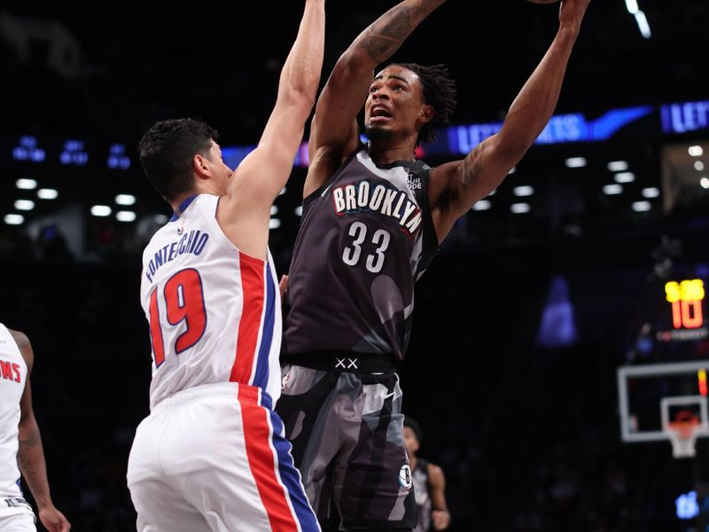 BROOKLYN, NY - JANUARY 8: Nicolas Claxton #33 of the Brooklyn Nets drives to the basket during the game against the Detroit Pistons on January 8, 2025 at Barclays Center in Brooklyn, New York. NOTE TO USER: User expressly acknowledges and agrees that, by downloading and or using this Photograph, user is consenting to the terms and conditions of the Getty Images License Agreement. Mandatory Copyright Notice: Copyright 2025 NBAE (Photo by Brandon Todd/NBAE via Getty Images)