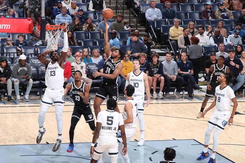 MEMPHIS, TN - February 26:  Cam Thomas #24 of the Brooklyn Nets drives to the basket during the game against the Memphis Grizzlies on February 26, 2024 at FedExForum in Memphis, Tennessee. NOTE TO USER: User expressly acknowledges and agrees that, by downloading and or using this photograph, User is consenting to the terms and conditions of the Getty Images License Agreement. Mandatory Copyright Notice: Copyright 2024 NBAE (Photo by Joe Murphy/NBAE via Getty Images)