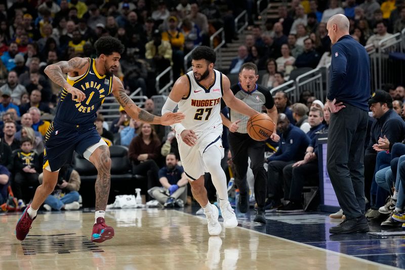 INDIANAPOLIS, IN - JANUARY 23: Jamal Murray #27 of the Denver Nuggets dribbles the ball during the game against the Indiana Pacers on January 23, 2024 at Gainbridge Fieldhouse in Indianapolis, Indiana. NOTE TO USER: User expressly acknowledges and agrees that, by downloading and or using this Photograph, user is consenting to the terms and conditions of the Getty Images License Agreement. Mandatory Copyright Notice: Copyright 2024 NBAE (Photo by AJ Mast/NBAE via Getty Images)