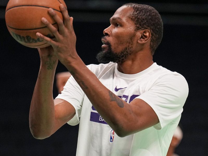 CHARLOTTE, NC - MARCH 1: Kevin Durant #7 of the Phoenix Suns warms up before the game against the Charlotte Hornets on March 1, 2023 at Spectrum Center in Charlotte, North Carolina. NOTE TO USER: User expressly acknowledges and agrees that, by downloading and or using this photograph, User is consenting to the terms and conditions of the Getty Images License Agreement. Mandatory Copyright Notice: Copyright 2023 NBAE (Photo by Jesse D. Garrabrant/NBAE via Getty Images)