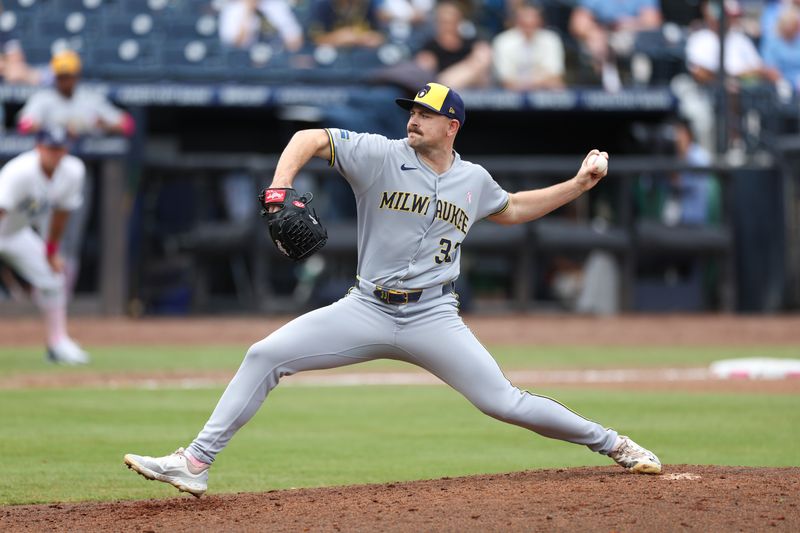 May 11, 2025; Tampa, Florida, USA; Milwaukee Brewers pitcher Tyler Alexander (33) throws a pitch against the Tampa Bay Rays in the fifth inning at George M. Steinbrenner Field. Mandatory Credit: Nathan Ray Seebeck-Imagn Images