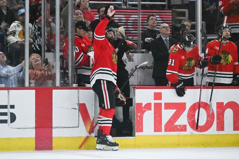 Apr 12, 2025; Chicago, Illinois, USA;  Chicago Blackhawks left wing Patrick Maroon (77) waves to fans during the first period against the Winnipeg Jets at United Center. He is retiring. Mandatory Credit: Matt Marton-Imagn Images