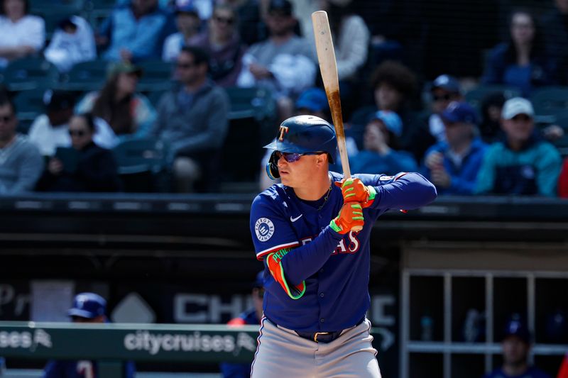 May 24, 2025; Chicago, Illinois, USA; Texas Rangers designated hitter Joc Pederson (4) bats against the Chicago White Sox during the first inning at Rate Field. Mandatory Credit: Kamil Krzaczynski-Imagn Images