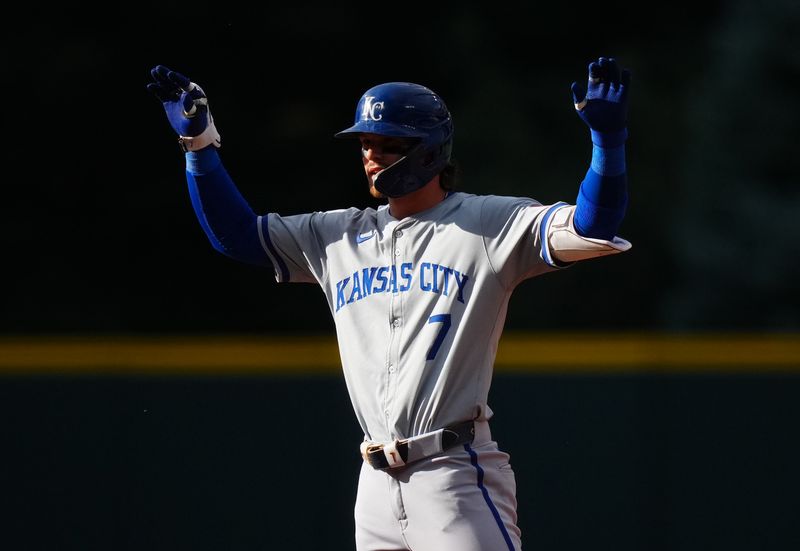 Jul 5, 2024; Denver, Colorado, USA; Kansas City Royals shortstop Bobby Witt Jr. (7) celebrates his double in the first inning against the Colorado Rockies at Coors Field. Mandatory Credit: Ron Chenoy-USA TODAY Sports