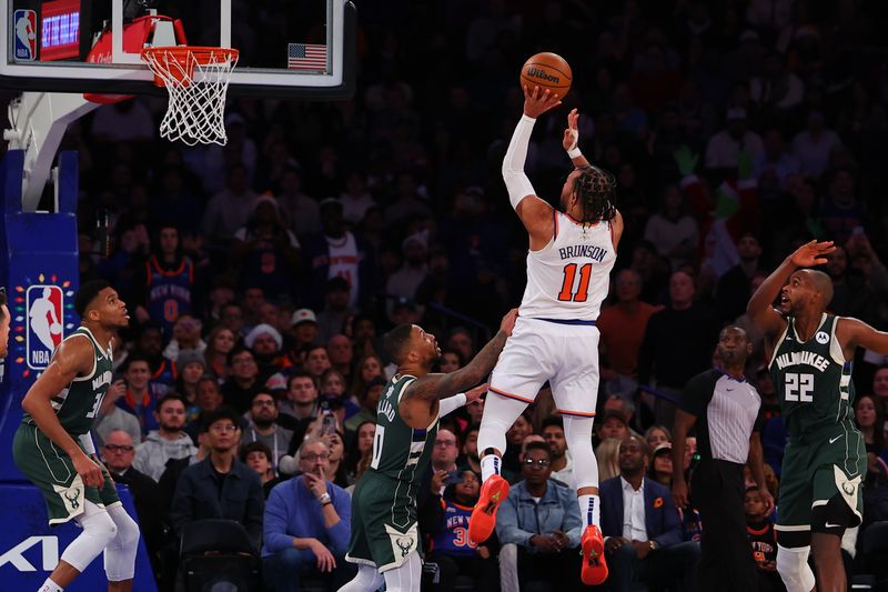 NEW YORK, NEW YORK - DECEMBER 25:  Jalen Brunson #11 of the New York Knicks shoots  during the fourth quarter of the game against the Milwaukee Bucks at Madison Square Garden on December 25, 2023 in New York City.  NOTE TO USER: User expressly acknowledges and agrees that, by downloading and or using this photograph, User is consenting to the terms and conditions of the Getty Images License Agreement. (Photo by Rich Graessle/Getty Images)