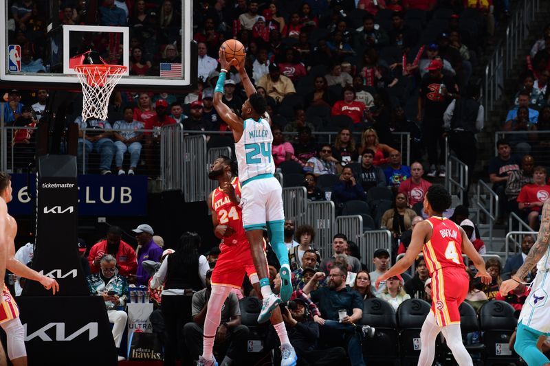 ATLANTA, GA - APRIL 10: Brandon Miller #24 of the Charlotte Hornets drives to the basket during the game against the Atlanta Hawks on April 10, 2024 at State Farm Arena in Atlanta, Georgia.  NOTE TO USER: User expressly acknowledges and agrees that, by downloading and/or using this Photograph, user is consenting to the terms and conditions of the Getty Images License Agreement. Mandatory Copyright Notice: Copyright 2024 NBAE (Photo by Scott Cunningham/NBAE via Getty Images)