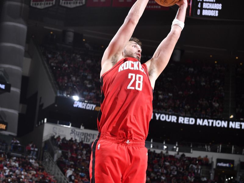 HOUSTON, TX - OCTOBER 23: Alperen Sengun #28 of the Houston Rockets rebounds the ball during the game against the Charlotte Hornets  during a regular season game on October 23, 2024 at the Toyota Center in Houston, Texas. NOTE TO USER: User expressly acknowledges and agrees that, by downloading and or using this photograph, User is consenting to the terms and conditions of the Getty Images License Agreement. Mandatory Copyright Notice: Copyright 2024 NBAE (Photo by Logan Riely/NBAE via Getty Images)