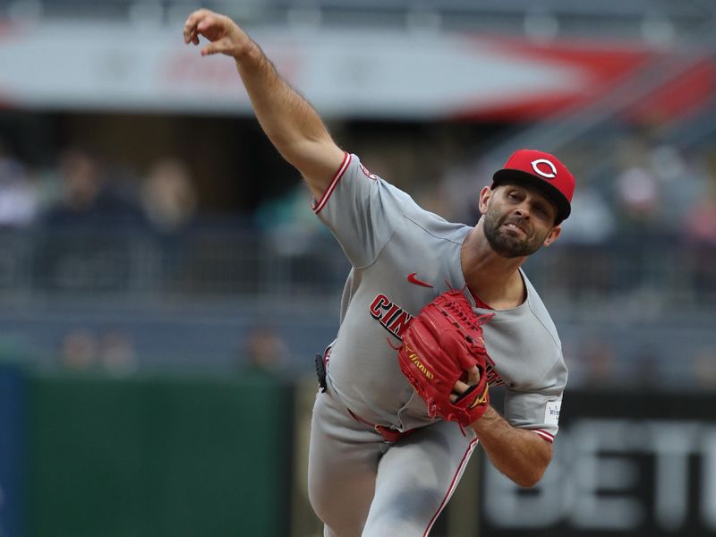 May 20, 2025; Pittsburgh, Pennsylvania, USA; Cincinnati Reds starting pitcher Nick Martinez (28) delivers a pitch against the Pittsburgh Pirates during the first inning at PNC Park. Mandatory Credit: Charles LeClaire-Imagn Images