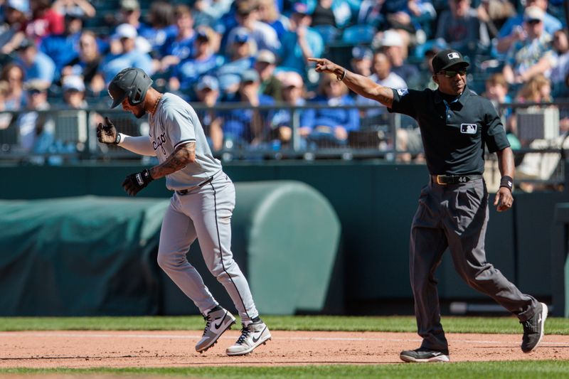 Apr 7, 2024; Kansas City, Missouri, USA; Chicago White Sox second base Lenyn Sosa (50) is told to take 2nd base after being tripped at first base during the eighth inning against the Kansas City Royals at Kauffman Stadium. Mandatory Credit: William Purnell-USA TODAY Sports