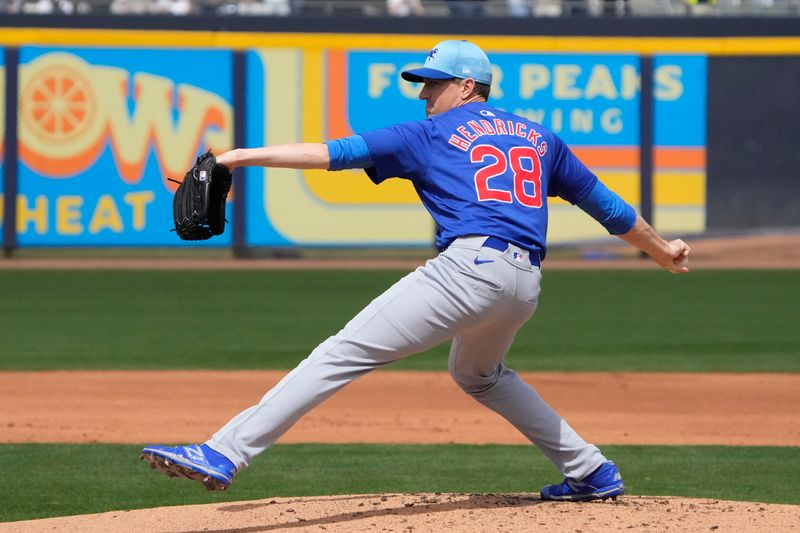 Mar 24, 2024; Peoria, Arizona, USA; Chicago Cubs starting pitcher Kyle Hendricks (28) throws against the Seattle Mariners in the first inning at Peoria Sports Complex. Mandatory Credit: Rick Scuteri-USA TODAY Sports