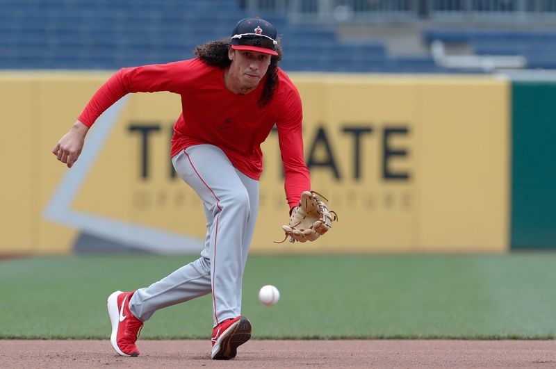 May 6, 2024; Pittsburgh, Pennsylvania, USA;  Los Angeles Angels third baseman Cole Tucker (8) takes ground balls  before the game against the Pittsburgh Pirates at PNC Park. Mandatory Credit: Charles LeClaire-USA TODAY Sports