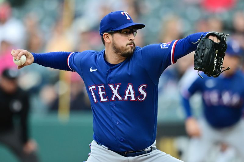 Sep 16, 2023; Cleveland, Ohio, USA; Texas Rangers starting pitcher Dane Dunning (33) throws a pitch during the first inning against the Cleveland Guardians at Progressive Field. Mandatory Credit: Ken Blaze-USA TODAY Sports