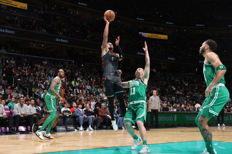 WASHINGTON, DC -? MARCH 17: Jared Butler #4 of the Washington Wizards drives to the basket during the game against the Boston Celtics on March 17, 2024 at Capital One Arena in Washington, DC. NOTE TO USER: User expressly acknowledges and agrees that, by downloading and or using this Photograph, user is consenting to the terms and conditions of the Getty Images License Agreement. Mandatory Copyright Notice: Copyright 2024 NBAE (Photo by Stephen Gosling/NBAE via Getty Images)