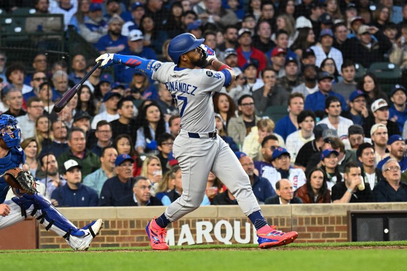 Apr 23, 2025; Chicago, Illinois, USA;  Los Angeles Dodgers outfielder Teoscar Hernández (37) hits a two-run home run during the fifth inning against the Chicago Cubs at Wrigley Field. Mandatory Credit: Matt Marton-Imagn Images