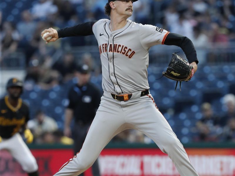 May 22, 2024; Pittsburgh, Pennsylvania, USA;  San Francisco Giants relief pitcher Sean Hjelle (64) pitches against the Pittsburgh Pirates during the fourth inning at PNC Park. Mandatory Credit: Charles LeClaire-USA TODAY Sports