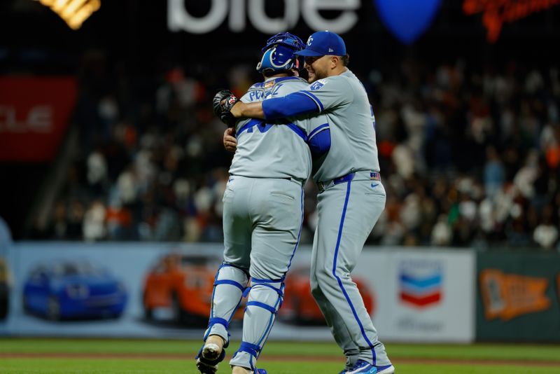 May 19, 2025; San Francisco, California, USA;  Kansas City Royals pitcher Carlos Estevez (53) celebrates with catcher Salvador Perez (13) after the game against the San Francisco Giants at Oracle Park. Mandatory Credit: Sergio Estrada-Imagn Images