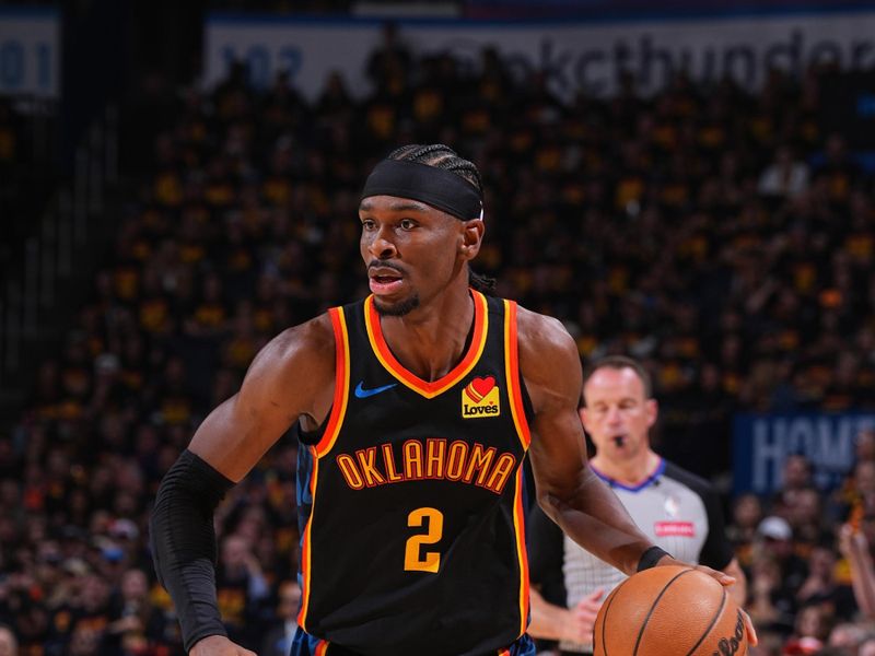 OKLAHOMA CITY, OK - MAY 5: Shai Gilgeous-Alexander #2 of the Oklahoma City Thunder handles the ball during the game against the Denver Nuggets during Round Two Game One of the 2025 NBA Playoffs on May 5, 2025 at Paycom Center in Oklahoma City, Oklahoma. NOTE TO USER: User expressly acknowledges and agrees that, by downloading and or using this photograph, User is consenting to the terms and conditions of the Getty Images License Agreement. Mandatory Copyright Notice: Copyright 2025 NBAE (Photo by Garrett Ellwood/NBAE via Getty Images)