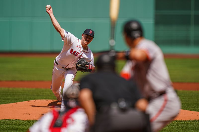 May 2, 2024; Boston, Massachusetts, USA; Boston Red Sox pitcher Josh Winckowski (25) throws a pitch against the San Francisco Giants in the first inning at Fenway Park. Mandatory Credit: David Butler II-USA TODAY Sports